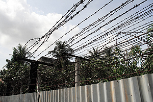 Barbed wire fence top
