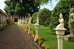 Statues lined up inside the entrance to the palace 