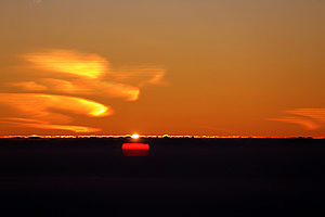 The sun rises over clouds 1500km away