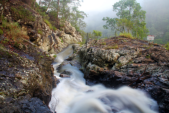 Stream rushing over the waterfall