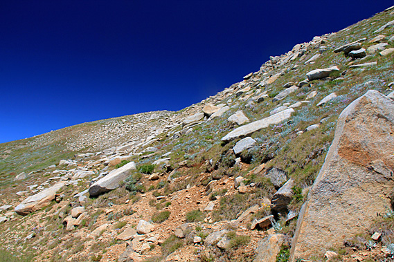 Dark blue sky towards the summit
