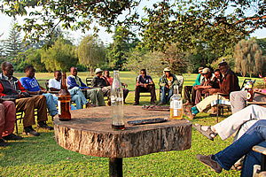 Guides and porters sitting in pecking order at the farewell