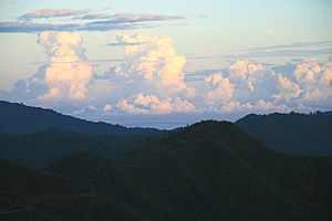 Distant storm clouds down the valley below 